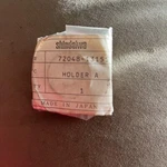 Nos Oem Shindaiwa 72048-13151 Holder Trimmer. Fixed Price $12.25.