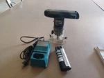 Makita Model 3700D Trim Router Charger & (battery Bad). Fixed Price $29.99.