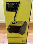 Ryobi RYSNW00 Snow Thrower Attachment - Black/green New In Box. Fixed Price $119.00.