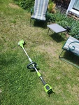 Greenworks 40 Volt Lithium Ion Battery Operated Trimmer Weedeater. Fixed Price $49.00.