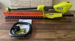 Ryobi 40V Expand-it 18 In. Hedge Trimmer Attachment With Motor New. Fixed Price $129.99.